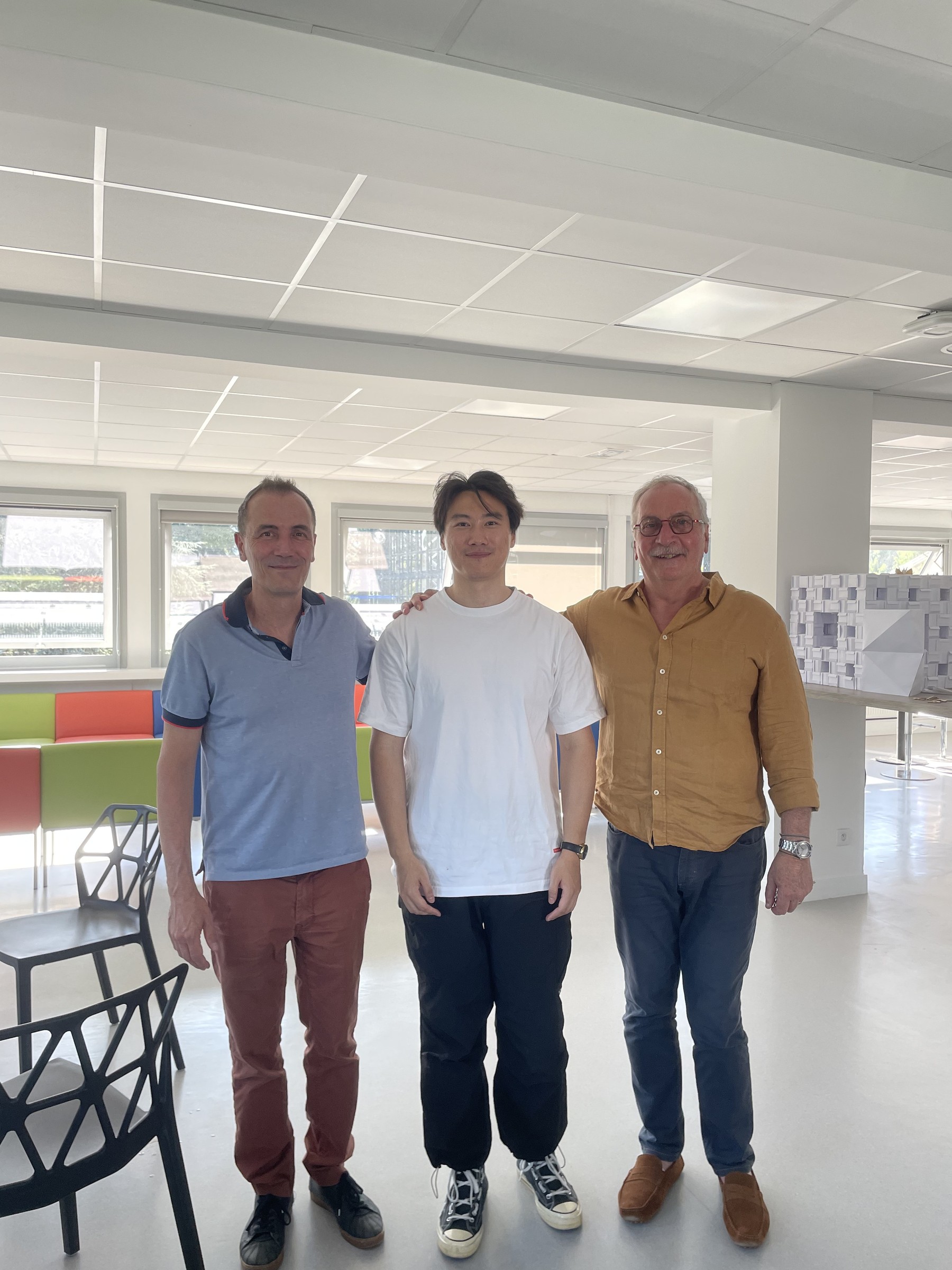 Hervé Gaussier, Zehao Sha, and Gérard Besson after Zehao Sha's defense